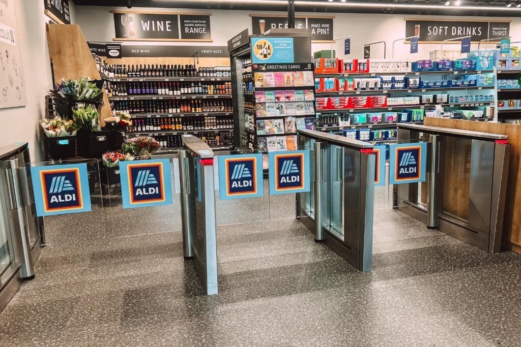 aldi checkout free store barriers where you enter and exit through a QR code