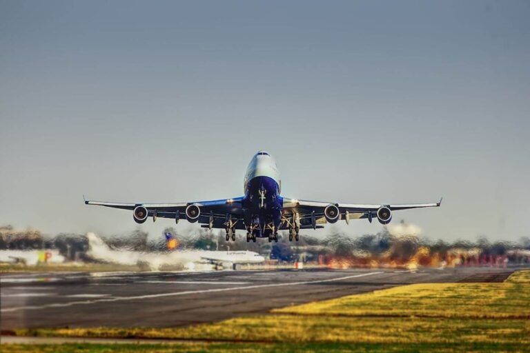 a plane taking off from the runway to show newcastle airport drop off free